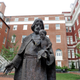 A Jesuit statue is seen in front of Freedom Hall, formerly named Mulledy Hall, on the Georgetown University campus on Sept. 1, 2016, in Washington, D.C. (Jacquelyn Martin/AP Images)